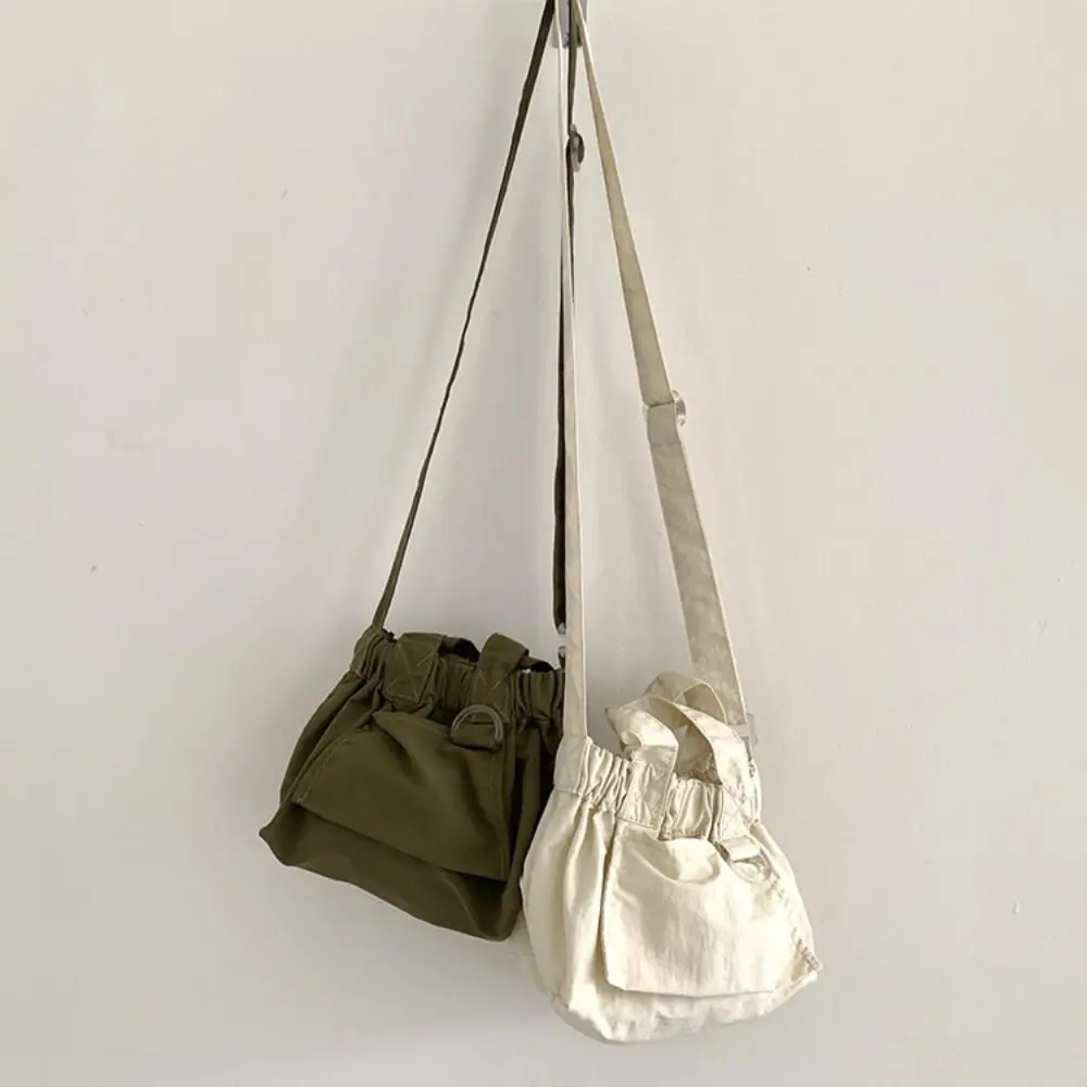 Sweet Korean Style Nylon Shoulder Bag Crossbody Bag Lightweight Canvas Messenger Bag Small Handbag Dumpling Bag Travel
Sweet Korean Style Nylon Shoulder Bag Crossbody Bag Lightweight Canvas Messenger Bag Small Handbag Dumpling Bag Travel