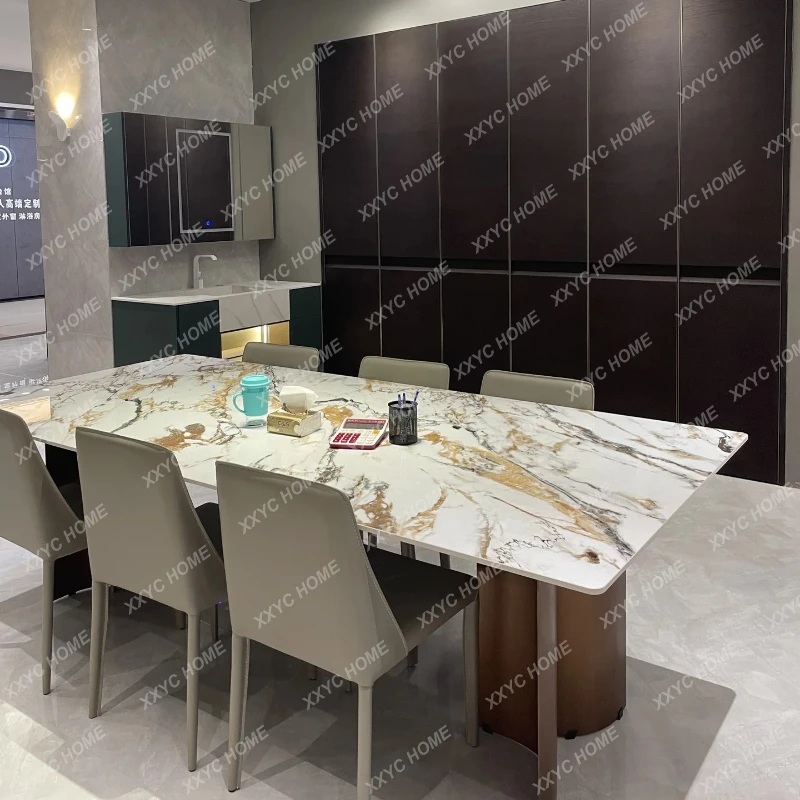 Минималистичный обеденный стол M Minimalist Deli Feng из каменной плиты, новый прямоугольный современный стол в стиле лёгкой роскоши, высококачественный обеденный стол.
Минималистичный обеденный стол M Minimalist Deli Feng из каменной плиты, новый прямоугольный современный стол в стиле лёгкой роскоши, высококачественный обеденный стол.