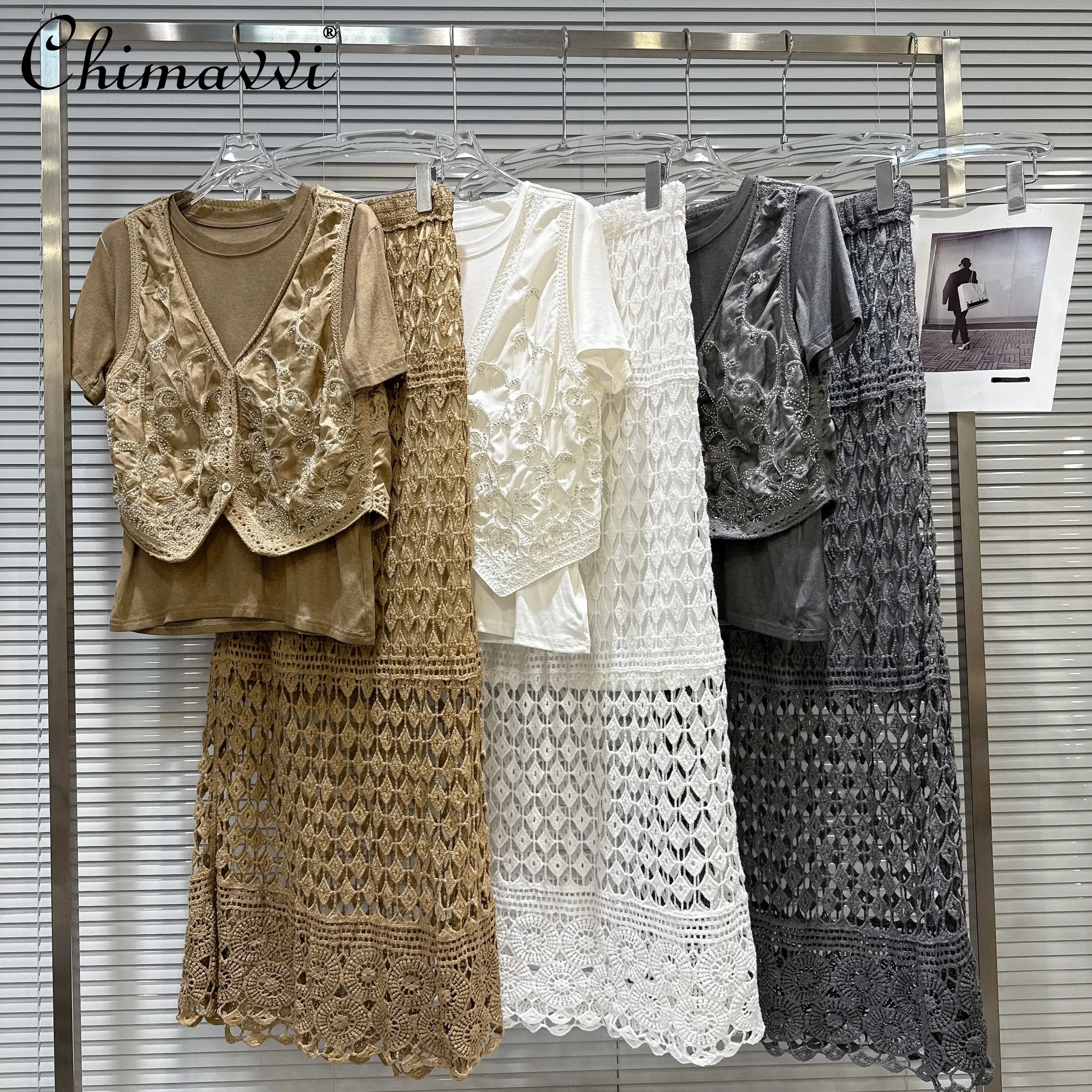 2025 Summer Clothes New Retro Spice Girl Beaded Vest Short-sleeved T-shirt and Hollow Midi Skirt Set Casual Women's Outfits
2025 Summer Clothes New Retro Spice Girl Beaded Vest Short-sleeved T-shirt and Hollow Midi Skirt Set Casual Women's Outfits