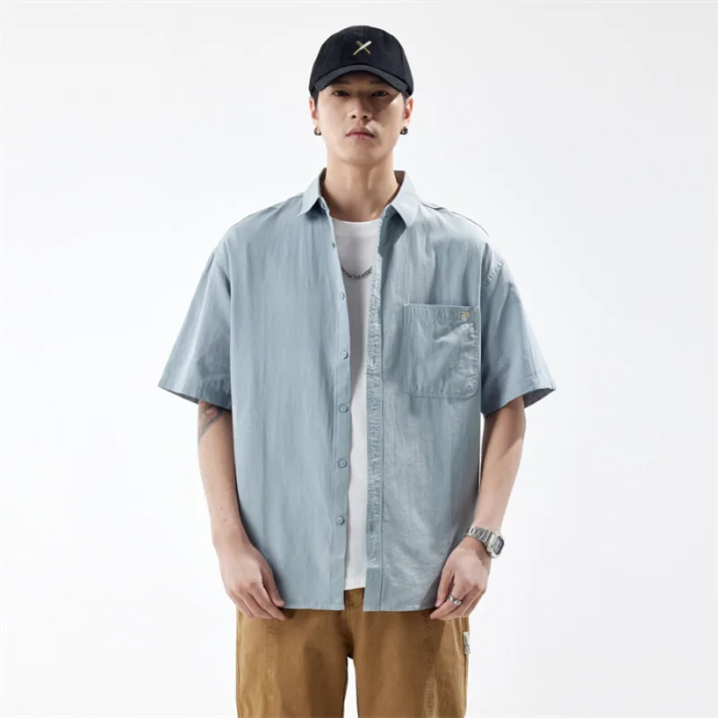 Мужская винтажная рабочая рубашка с коротким рукавом, летняя хлопковая повседневная рубашка свободного кроя с воротником на пуговицах и универсальным карманом в стиле ретро
Мужская винтажная рабочая рубашка с коротким рукавом, летняя хлопковая повседневная рубашка свободного кроя с воротником на пуговицах и универсальным карманом в стиле ретро