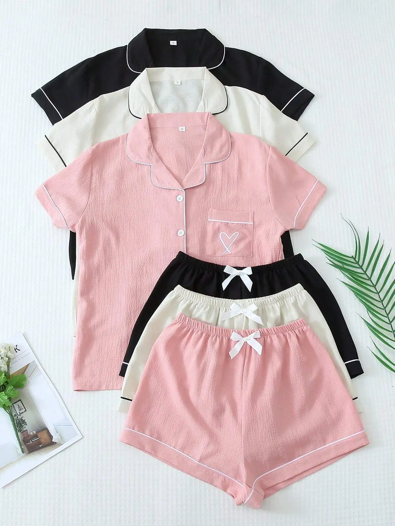 3-Piece Women's Short Sleeve Pajama Set with Contrast Trim, Pocket & Bow Shorts
3-Piece Women's Short Sleeve Pajama Set with Contrast Trim, Pocket & Bow Shorts