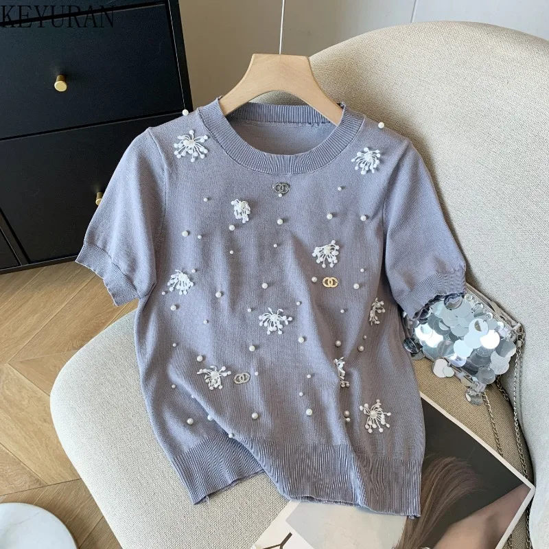 Лето 2022, тонкий вязаный пуловер, свитер, футболки, женские футболки с круглым вырезом и короткими рукавами, универсальные белые трикотажные топы с бисером, футболки
Лето 2022, тонкий вязаный пуловер, свитер, футболки, женские футболки с круглым вырезом и короткими рукавами, универсальные белые трикотажные топы с бисером, футболки