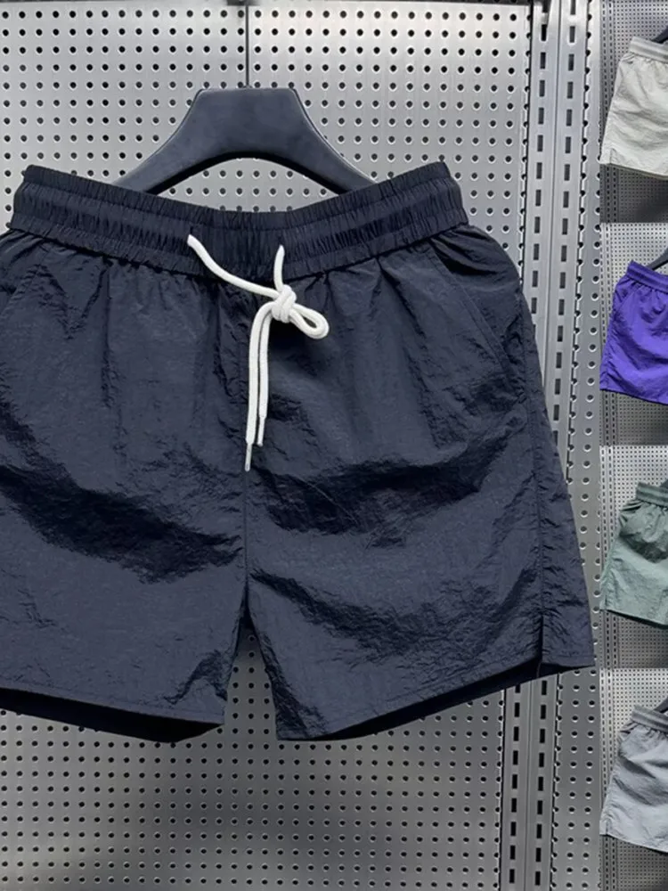 Summer Thin Four-Quarter Dstring Beach orts Men's Loose Casual Faion Brand Pure Color Leisure Straight Leg Pants
Summer Thin Four-Quarter Dstring Beach orts Men's Loose Casual Faion Brand Pure Color Leisure Straight Leg Pants