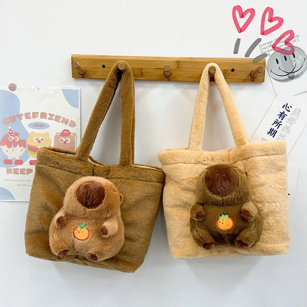 Fashion Cartoon Capybara Handbag Korean Style Magnetic Buckle Fluffy Shoulder Bag Soft Large Capacity Kid Schoolbag Travel
Fashion Cartoon Capybara Handbag Korean Style Magnetic Buckle Fluffy Shoulder Bag Soft Large Capacity Kid Schoolbag Travel