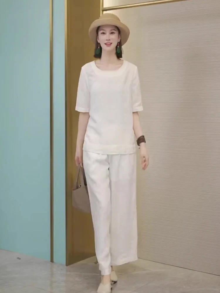 Fashionable Casual Summer Set Women's Minimalist High-End Feelings Sleeve T-Shirt Wide Leg Nine Points Pants Two-Piece Set
Fashionable Casual Summer Set Women's Minimalist High-End Feelings Sleeve T-Shirt Wide Leg Nine Points Pants Two-Piece Set