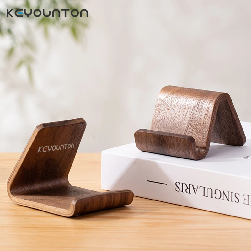 Multifunctional Solid Wood Phone Holder Front Desk Business Card Display Rack Creative Home Office All phones Desktop Decoration
Multifunctional Solid Wood Phone Holder Front Desk Business Card Display Rack Creative Home Office All phones Desktop Decoration