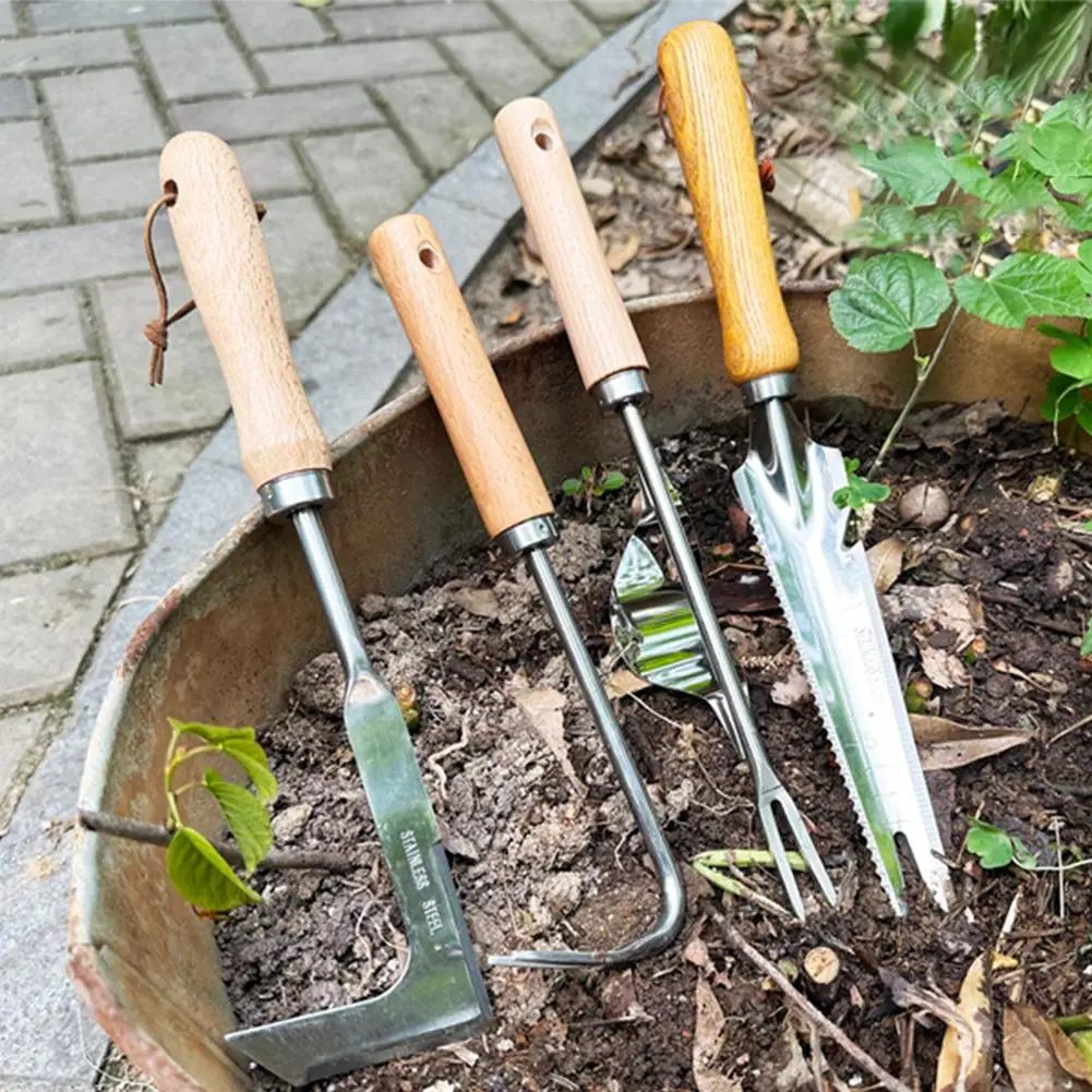 4pcs set of gardening tools - stainless steel gardening tools with wooden handles suitable for plantingweeding and looseningsoil
4pcs set of gardening tools - stainless steel gardening tools with wooden handles suitable for plantingweeding and looseningsoil