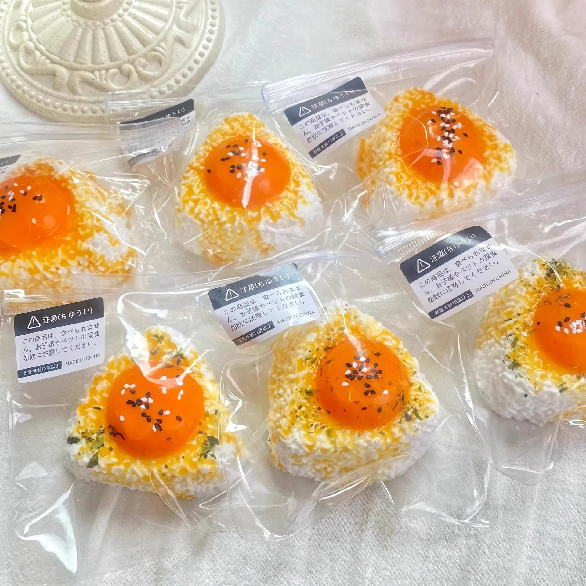 Egg yolk rice ball mush squish fun stress relief creative gift toy
Egg yolk rice ball mush squish fun stress relief creative gift toy