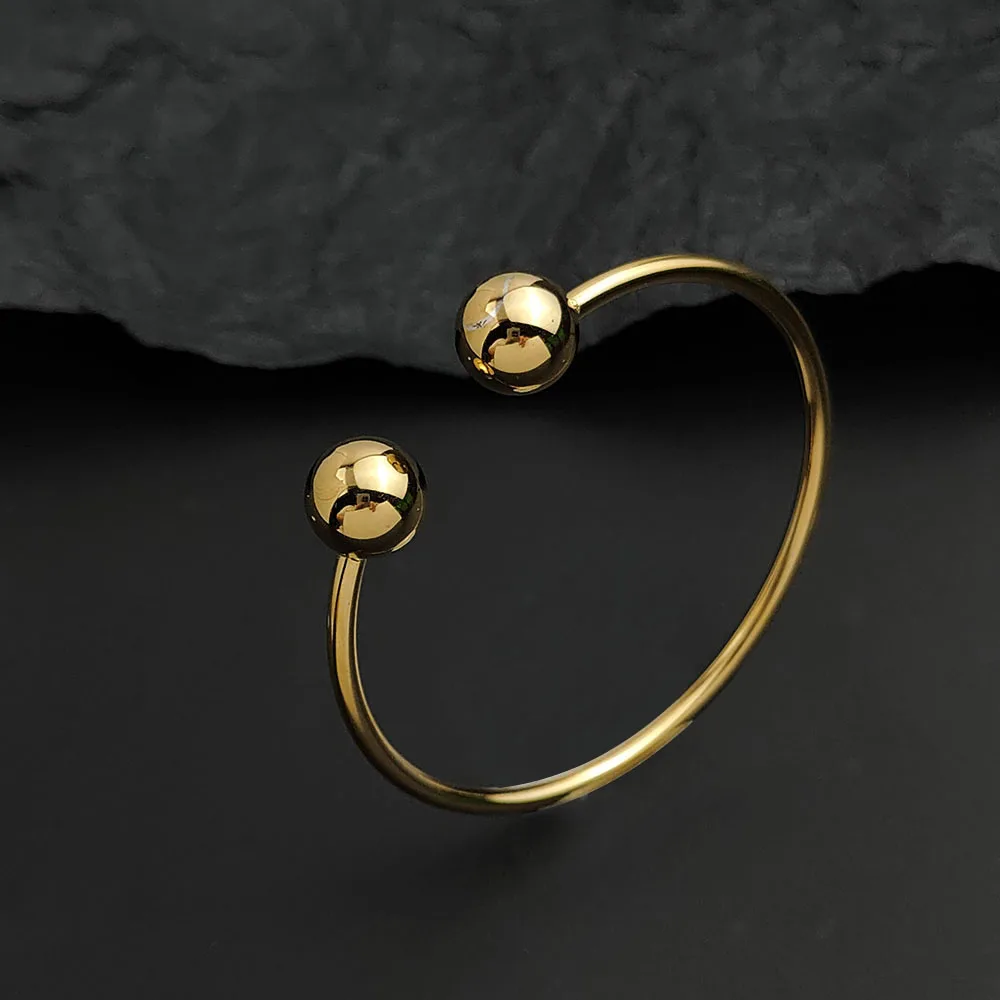 Simple wire double ball gold-plated stainless steel women's bracelet, waterproof and rust-free, worn by couples
Simple wire double ball gold-plated stainless steel women's bracelet, waterproof and rust-free, worn by couples