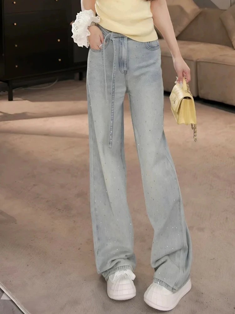 Женские модные джинсы с широкими штанинами, украшенные стразами, новинка весенней коллекции, с высокой талией, длинные, блестящие, трендовые
Женские модные джинсы с широкими штанинами, украшенные стразами, новинка весенней коллекции, с высокой талией, длинные, блестящие, трендовые