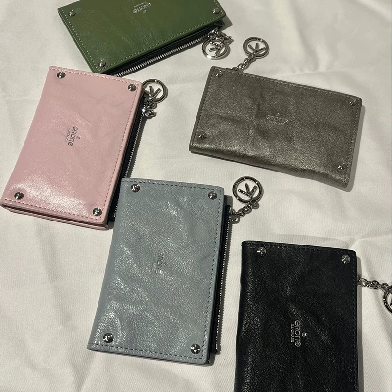 Summer new sheepskin multi slot couple style simple hand-held long card bag leather zipper coin purse
Summer new sheepskin multi slot couple style simple hand-held long card bag leather zipper coin purse