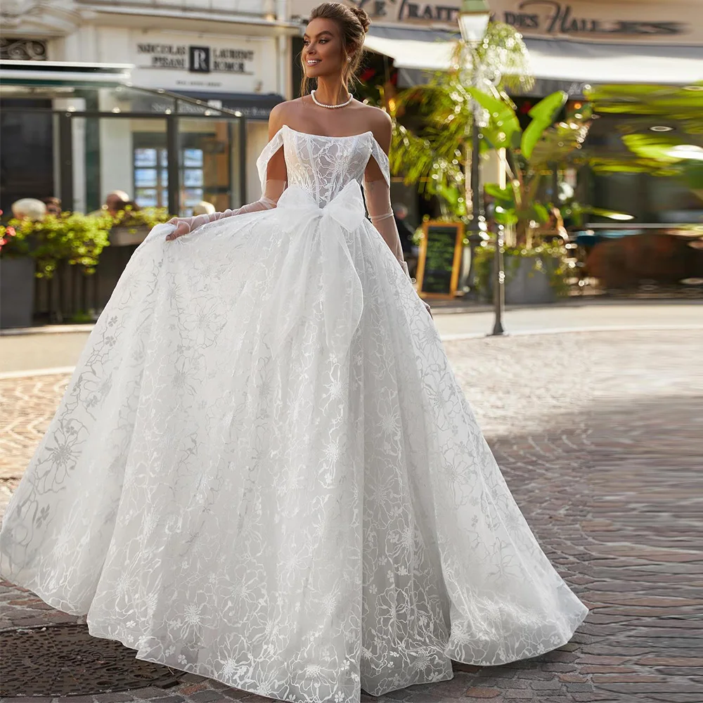 Customized Appliques Organza Wedding Dress Modern A-Line Strapless Bridal Gowns with Off the Shoulder Elegant Bow Robe de mariée
Customized Appliques Organza Wedding Dress Modern A-Line Strapless Bridal Gowns with Off the Shoulder Elegant Bow Robe de mariée
