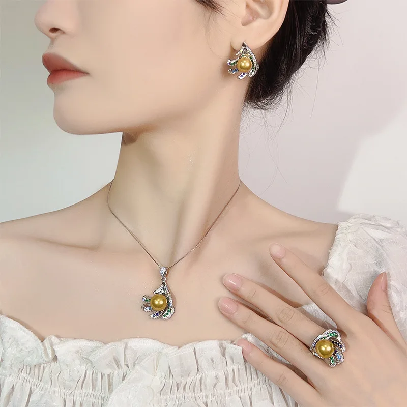 New style pearl earrings, necklace and ring set for women, with a high-end and fashionable feel.
New style pearl earrings, necklace and ring set for women, with a high-end and fashionable feel.