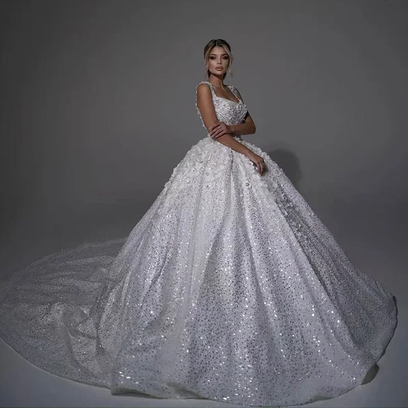 Роскошное свадебное платье с бисером и блестками, бальное платье принцессы без рукавов с квадратным воротником, индивидуальное платье невесты Vestido De Novia
Роскошное свадебное платье с бисером и блестками, бальное платье принцессы без рукавов с квадратным воротником, индивидуальное платье невесты Vestido De Novia