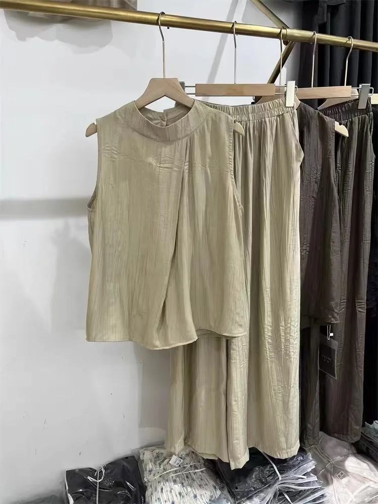 Casual Cotton Linen Set Women's Summer Design Sensation Sleeveless Top Wide Leg Pants Two Piece Set Fashionable Pleated
Casual Cotton Linen Set Women's Summer Design Sensation Sleeveless Top Wide Leg Pants Two Piece Set Fashionable Pleated