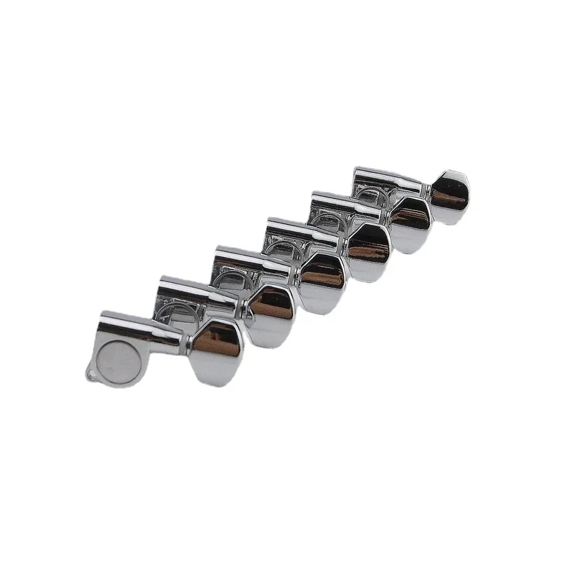 1 комплект, 6 линейных металлических гитарных головок, тюнеры, хром с винтом
1 комплект, 6 линейных металлических гитарных головок, тюнеры, хром с винтом