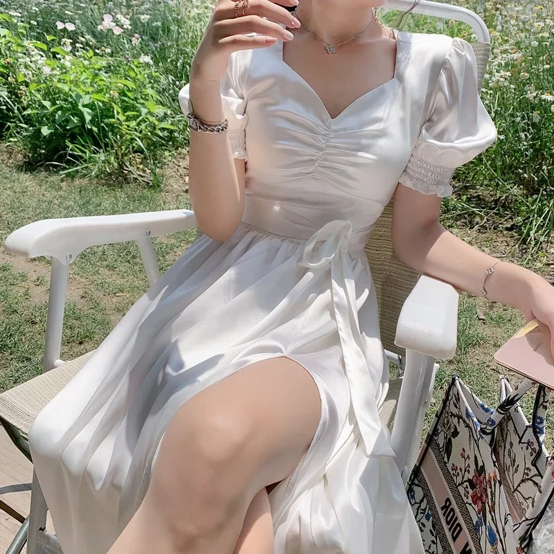 Women Summer Sexy White Puff Sleeve Slim White Dress New Fairy Satin V-neck Side Slit Elegant Sweet Long Cottagecore Dresses
Women Summer Sexy White Puff Sleeve Slim White Dress New Fairy Satin V-neck Side Slit Elegant Sweet Long Cottagecore Dresses