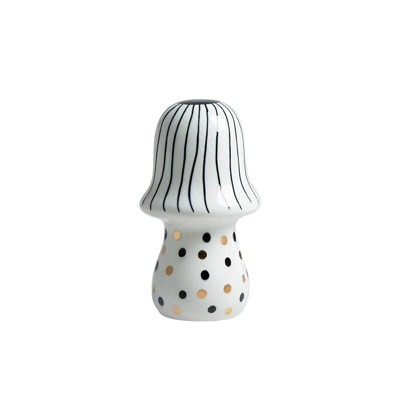 Nordic modern hand-painted ceramic polka dot mushroom ornament
Nordic modern hand-painted ceramic polka dot mushroom ornament