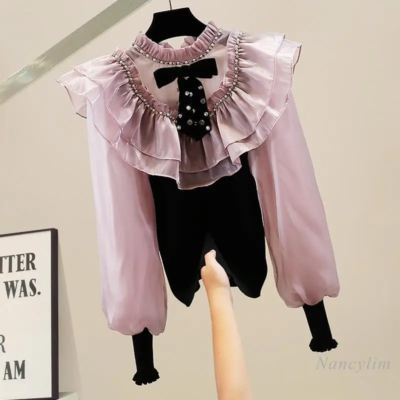 Fashion Heavy Industry Beads Sexy Bow Decorative Temperament Knitted Sweater Ladies Lantern Sleeve Versatile Top Spring Winter
Fashion Heavy Industry Beads Sexy Bow Decorative Temperament Knitted Sweater Ladies Lantern Sleeve Versatile Top Spring Winter