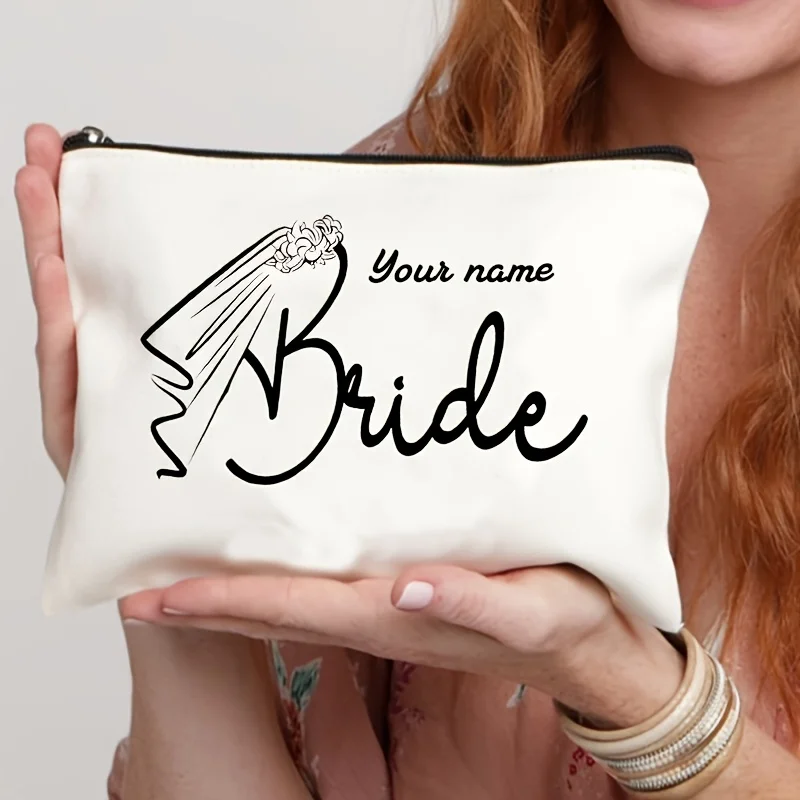 A Personalized Makeup Bag with a Custom Name Designed for Brides Featuring Floral and Dress Illustrations Foldable Zipper
A Personalized Makeup Bag with a Custom Name Designed for Brides Featuring Floral and Dress Illustrations Foldable Zipper