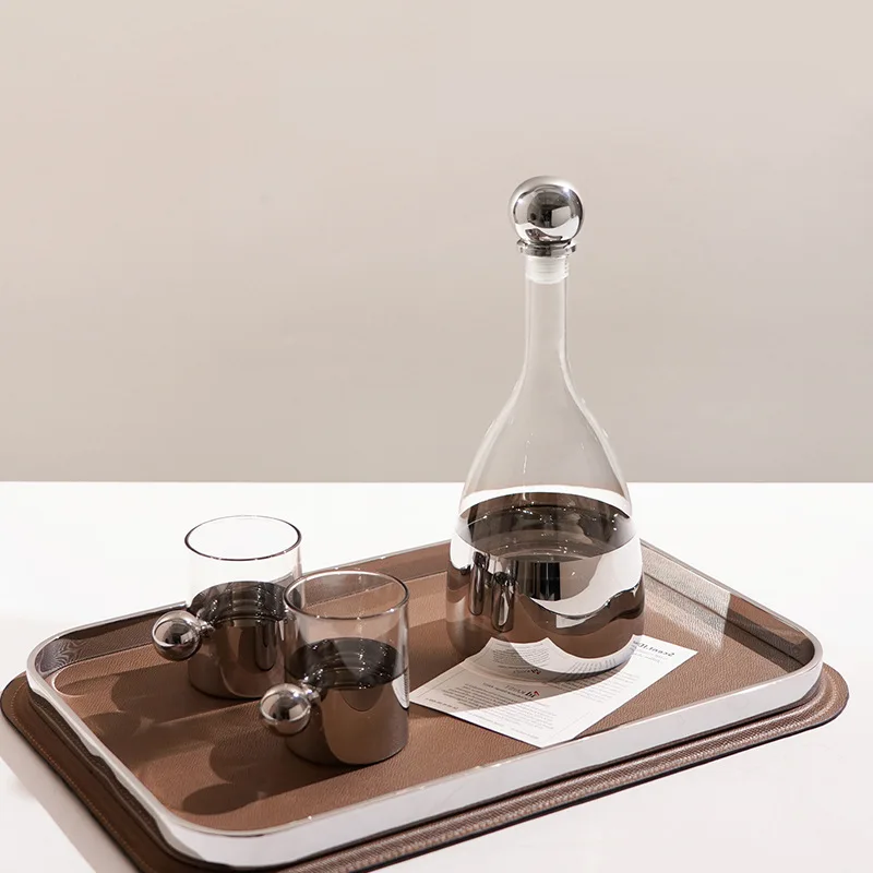 Simple modern light luxury kettle water cup set glass tea set coffee table restaurant desktop ornament model room decoration
Simple modern light luxury kettle water cup set glass tea set coffee table restaurant desktop ornament model room decoration