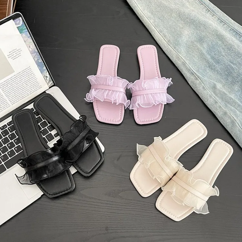 Новые летние кружевные мягкие нескользящие износостойкие женские шлепанцы с квадратным носком и открытым носком, большие размеры, тапочки на плоской подошве 
Новые летние кружевные мягкие нескользящие износостойкие женские шлепанцы с квадратным носком и открытым носком, большие размеры, тапочки на плоской подошве