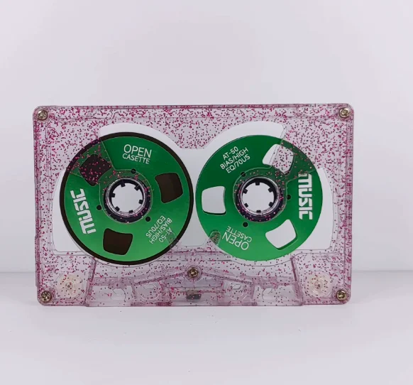 Double-sided metal hollow small open tape 50-minute type a tape transparent glitter shell + green disc
Double-sided metal hollow small open tape 50-minute type a tape transparent glitter shell + green disc