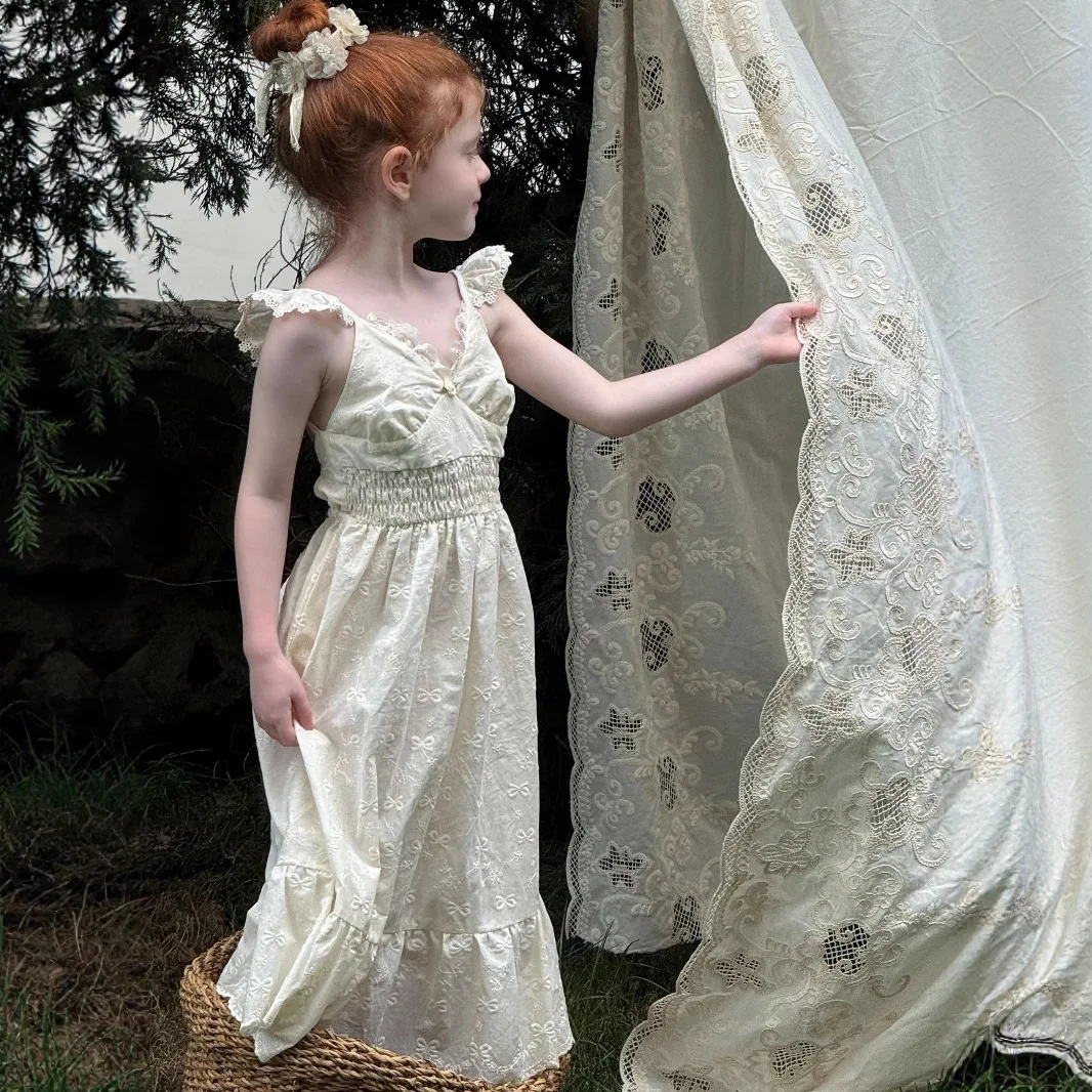 2025 Summer New Children Clothing Korean Girls Embroidered Strap Dress Children Seaside Style Lace Long Dress
2025 Summer New Children Clothing Korean Girls Embroidered Strap Dress Children Seaside Style Lace Long Dress