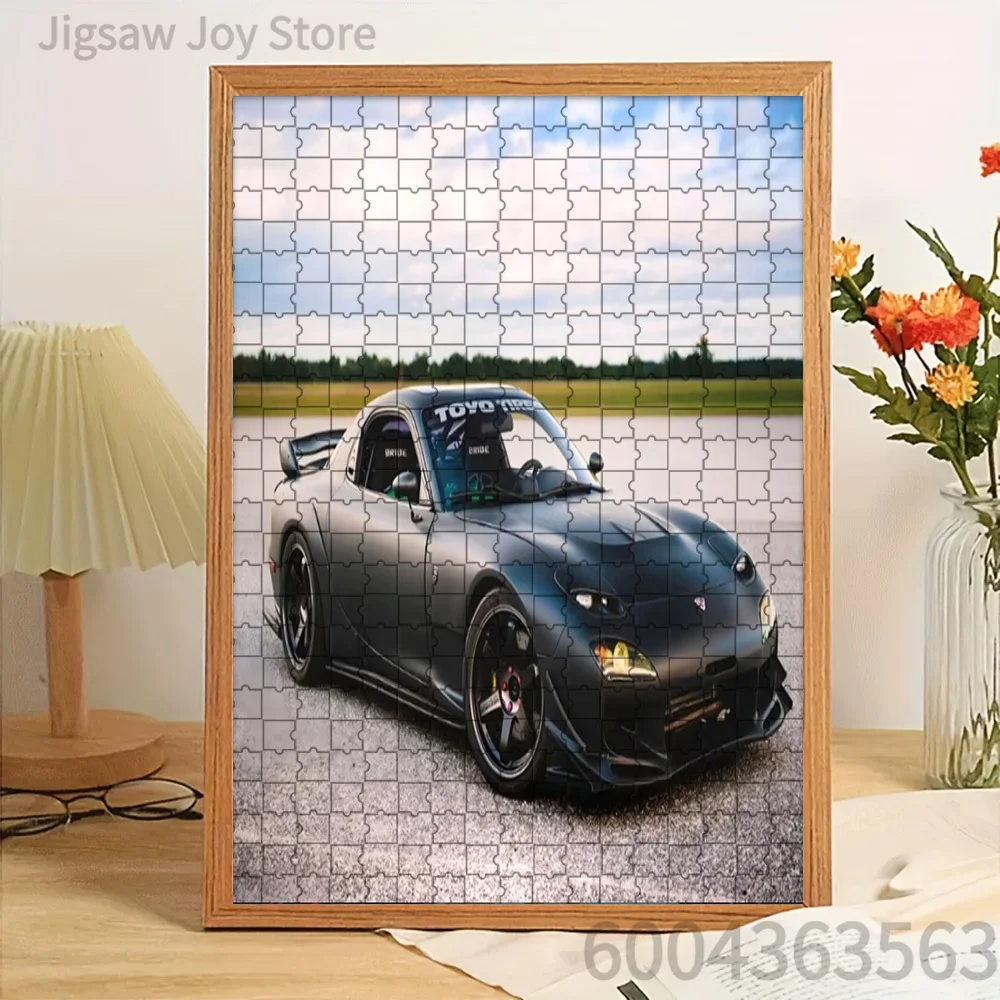 Paper Jigsaw Puzzle Black Mazda RX-7 FD3S Sports Car with Modified Body Kit on Open Track Background Artwork Brain Teaser
Paper Jigsaw Puzzle Black Mazda RX-7 FD3S Sports Car with Modified Body Kit on Open Track Background Artwork Brain Teaser