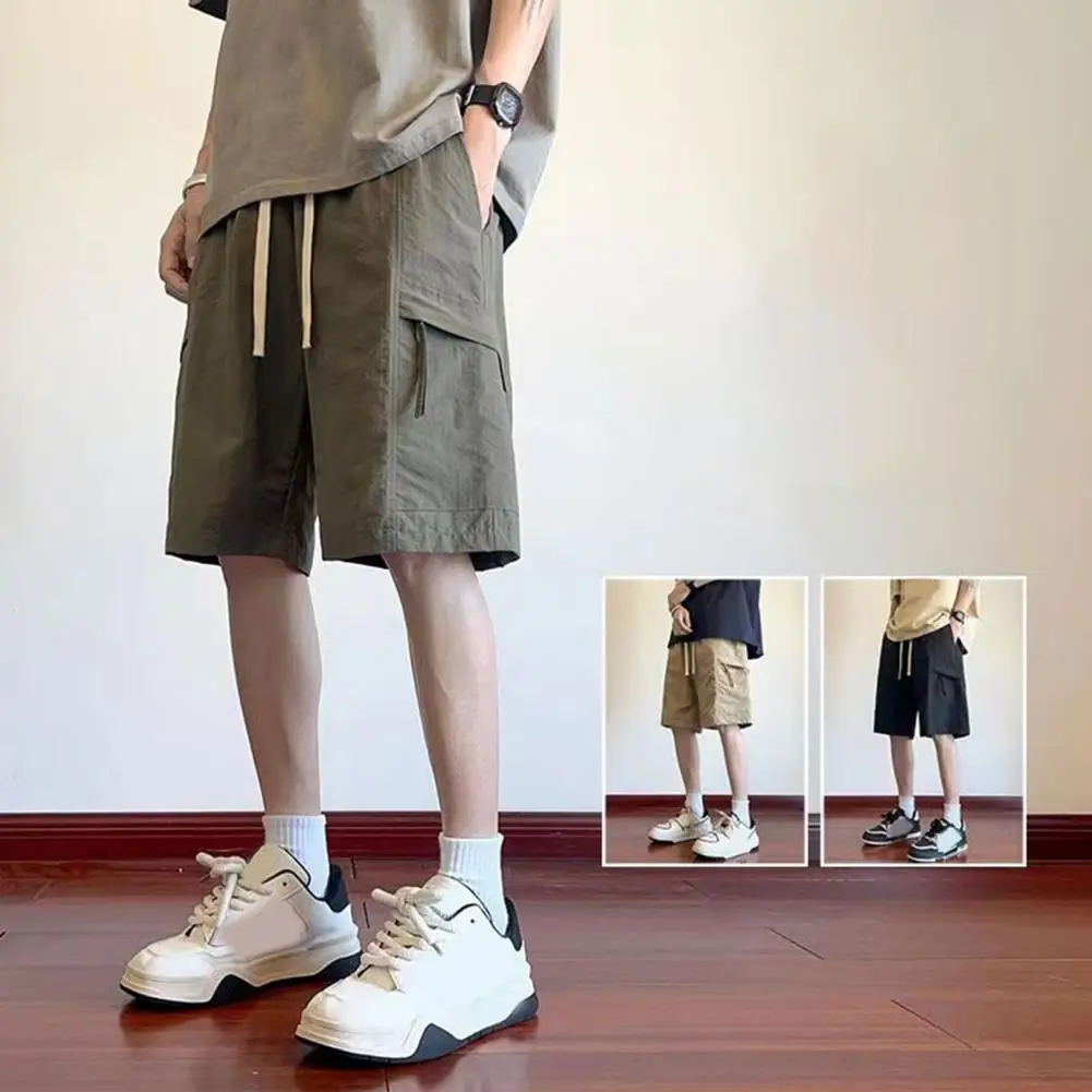 Men Polyester Cargo Shorts Comfortable Men Shorts Men's Knee Length Cargo Shorts with Drawstring Waist Quick-drying Loose Fit
Men Polyester Cargo Shorts Comfortable Men Shorts Men's Knee Length Cargo Shorts with Drawstring Waist Quick-drying Loose Fit