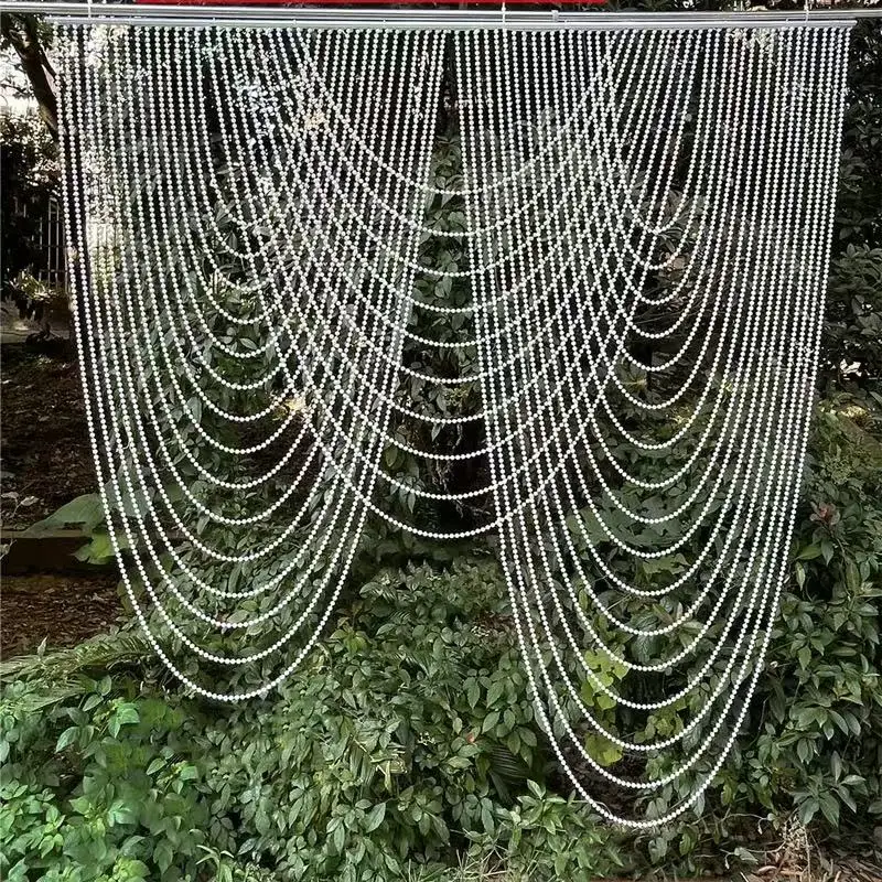 Wedding Decoration Water Wave Pearl Bead Chain Ceiling Arch Hotel Stage Banquet Center Components Background Decoration Props
Wedding Decoration Water Wave Pearl Bead Chain Ceiling Arch Hotel Stage Banquet Center Components Background Decoration Props