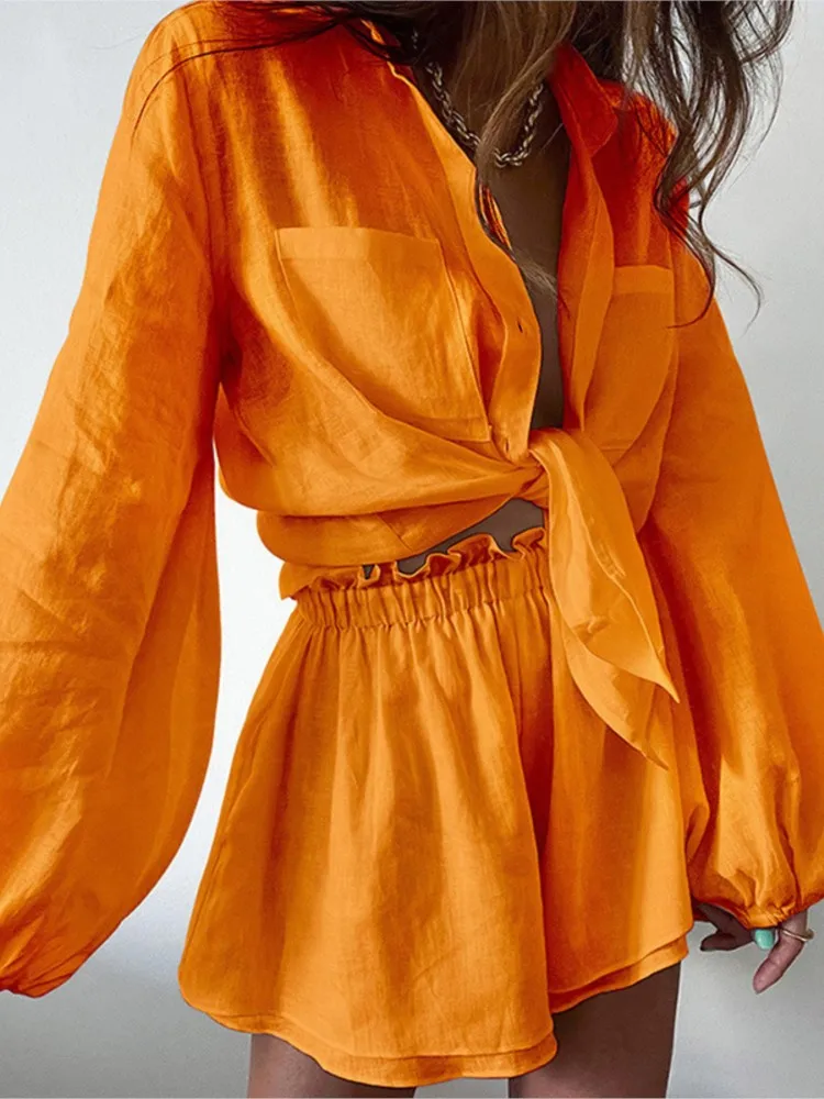 Summer New Women's Solid Color Ruffled Shorts Long-sleeved Suit Fashion Casual Loose Pocket Top Shorts Two-piece Set Females
Summer New Women's Solid Color Ruffled Shorts Long-sleeved Suit Fashion Casual Loose Pocket Top Shorts Two-piece Set Females