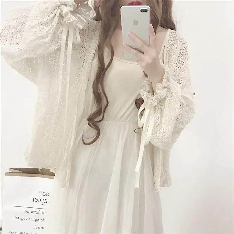 Lace cardigan Women Long Sleeve Hook Flower Hollow Fairy Thin Tops Fashion Elegant Chic Shirts Summer Coat felmale clothing
Lace cardigan Women Long Sleeve Hook Flower Hollow Fairy Thin Tops Fashion Elegant Chic Shirts Summer Coat felmale clothing