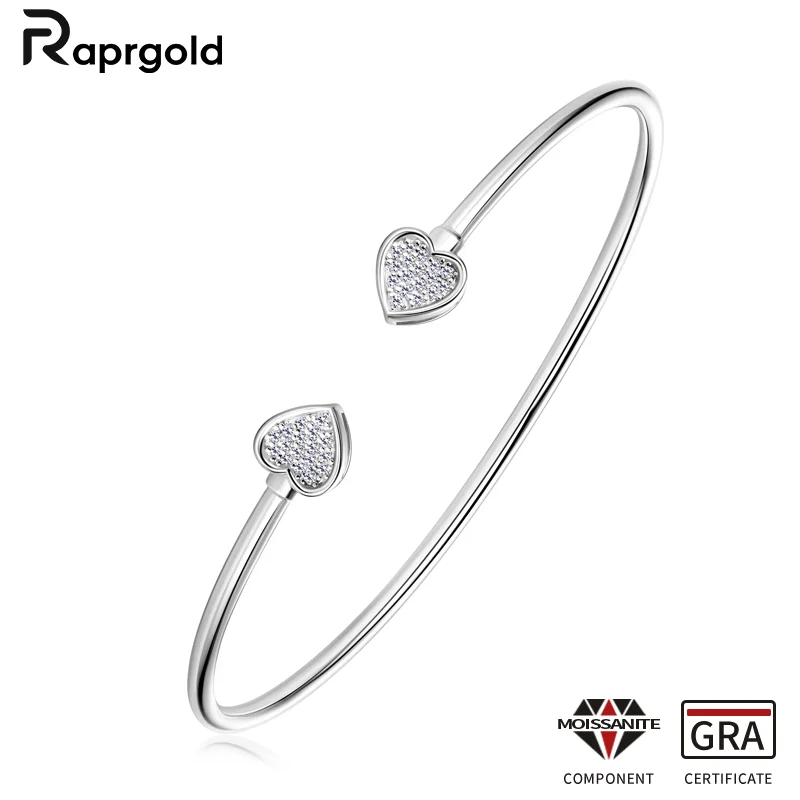 RAPRGOLD GRA сертифицированный муассанит браслет с сердечком любви-манжета для женщин браслеты из стерлингового серебра 925 пробы свадебные украшения подарки браслет
RAPRGOLD GRA сертифицированный муассанит браслет с сердечком любви-манжета для женщин браслеты из стерлингового серебра 925 пробы свадебные украшения подарки браслет