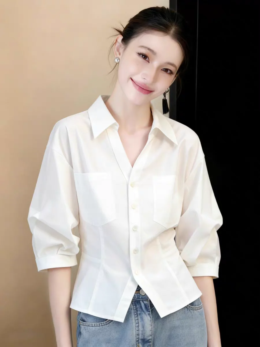 Elegant V-Neck 3/4 Sleeve Shirt Women's Summer 2026 Slimming Waist Design Fashionable Top Korean Style Pure Cotton Commute Wind
Elegant V-Neck 3/4 Sleeve Shirt Women's Summer 2026 Slimming Waist Design Fashionable Top Korean Style Pure Cotton Commute Wind