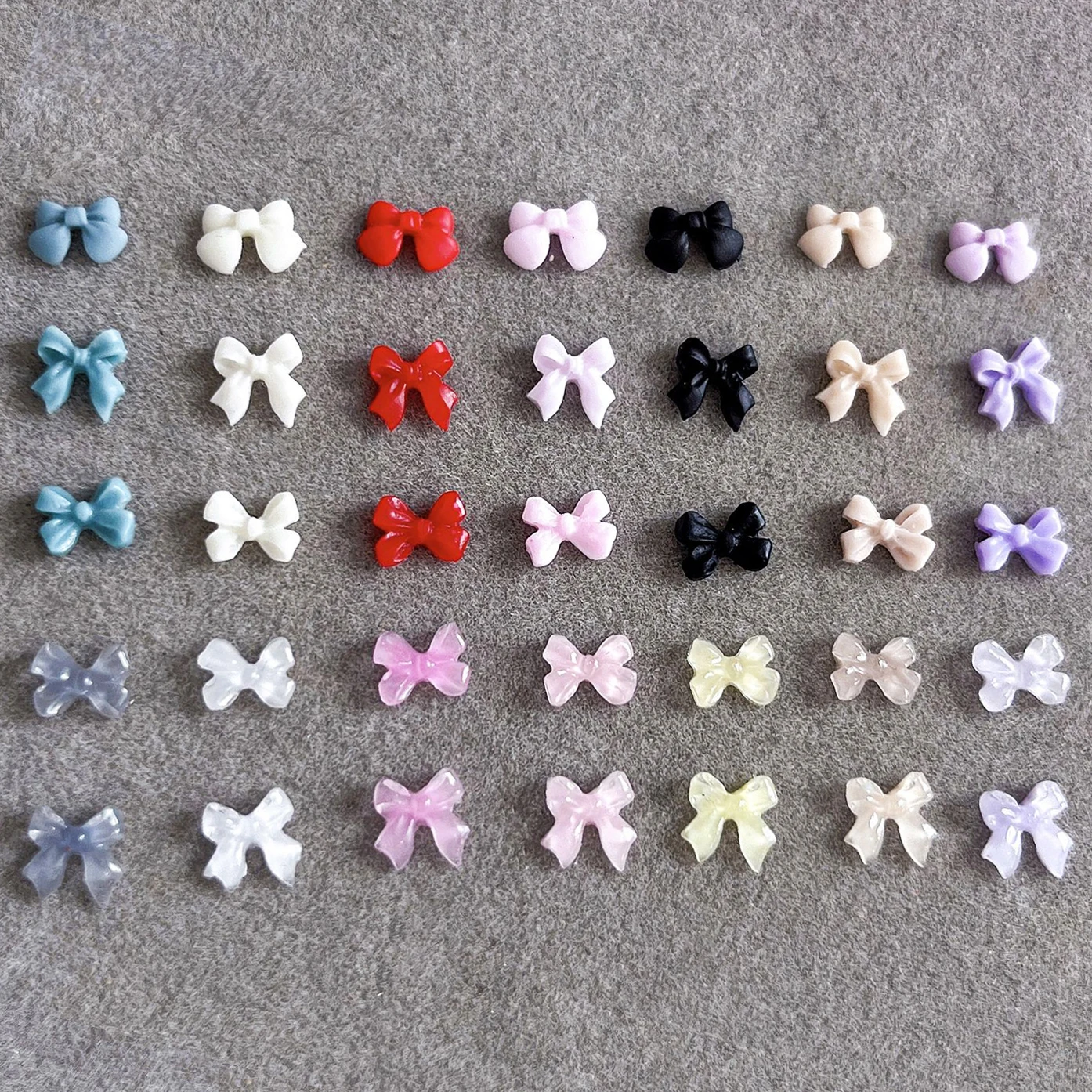 Colorful Resin Bow Tie Red White Black Bowknot Cute Ribbon Sweet Nail Art Accessories Charms Pearl Decoration Manicure Wholesale
Colorful Resin Bow Tie Red White Black Bowknot Cute Ribbon Sweet Nail Art Accessories Charms Pearl Decoration Manicure Wholesale