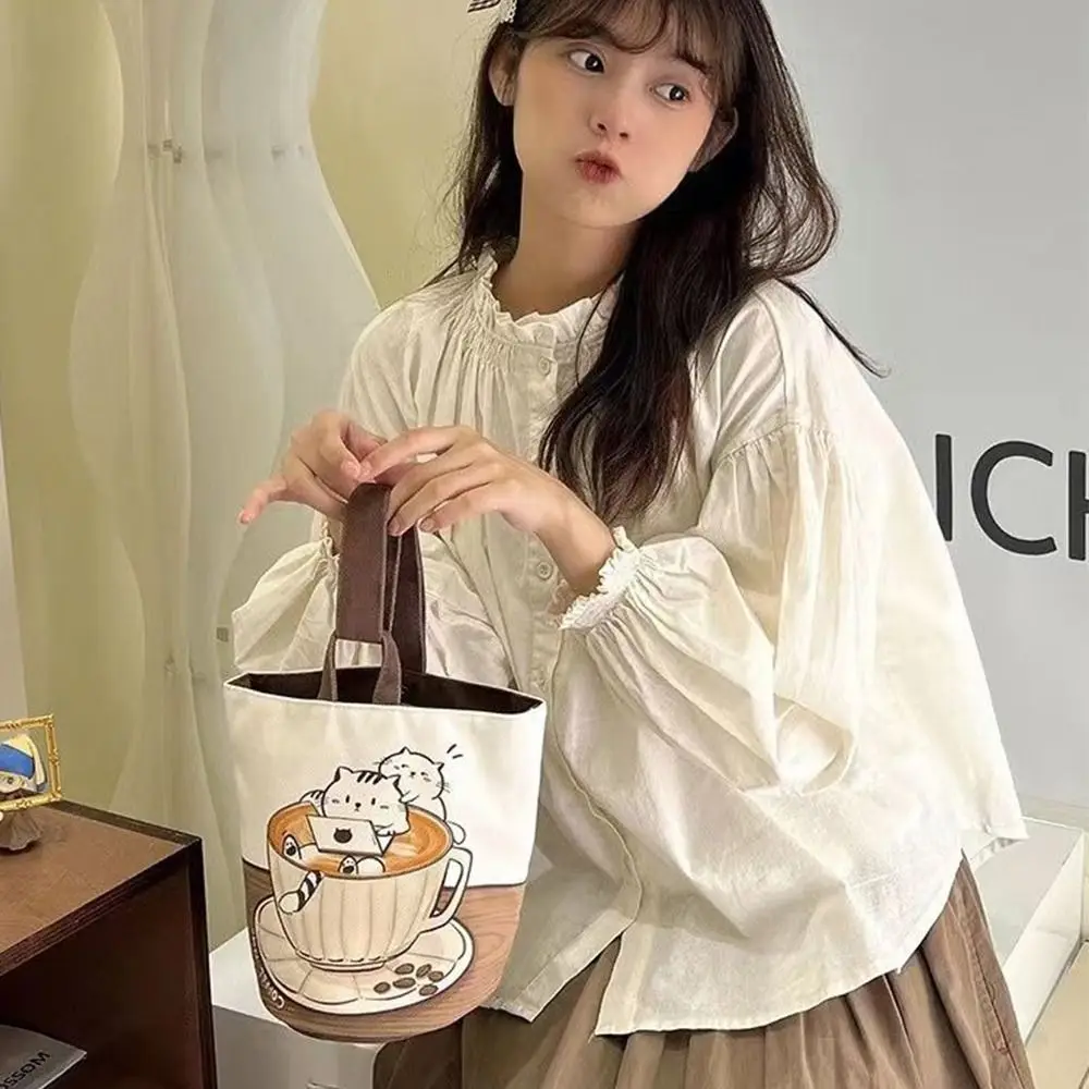 Korean Style Cartoon Coffee Cat Bucket Bag Cute Large Capacity Shopping Bags Mummy Bag Tote Bag Canvas Handbag Lunch Bag Travel
Korean Style Cartoon Coffee Cat Bucket Bag Cute Large Capacity Shopping Bags Mummy Bag Tote Bag Canvas Handbag Lunch Bag Travel