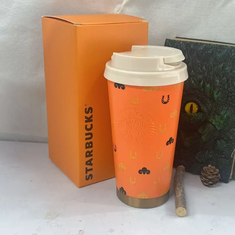 Starbucks Whimsical Horseshoe & Cloud Mug, 355ml Bright Orange Insulated Cup with Embossed Logo & Gold Trim Base
Starbucks Whimsical Horseshoe & Cloud Mug, 355ml Bright Orange Insulated Cup with Embossed Logo & Gold Trim Base