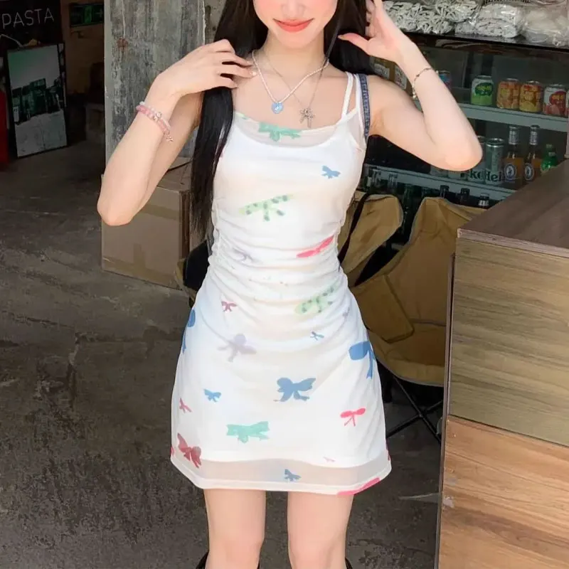Aura Gentle Bow Printed Waist Slip Mini Dress Summer Slim Female Clothing Sleeveless Fake Two Pieces Chic Folds Bag Hip Dresses
Aura Gentle Bow Printed Waist Slip Mini Dress Summer Slim Female Clothing Sleeveless Fake Two Pieces Chic Folds Bag Hip Dresses