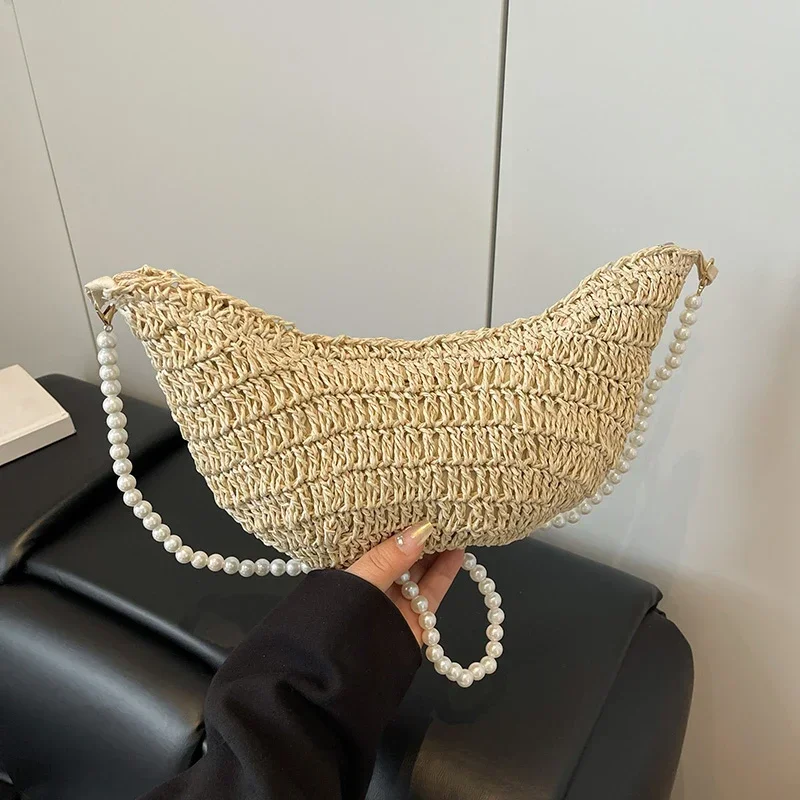 Соломенные тканые повседневные сумки на плечо с бисером, индивидуальные модные портативные сумки через плечо высокого качества для женщин, новинка весны 2023 г.
Соломенные тканые повседневные сумки на плечо с бисером, индивидуальные модные портативные сумки через плечо высокого качества для женщин, новинка весны 2023 г.