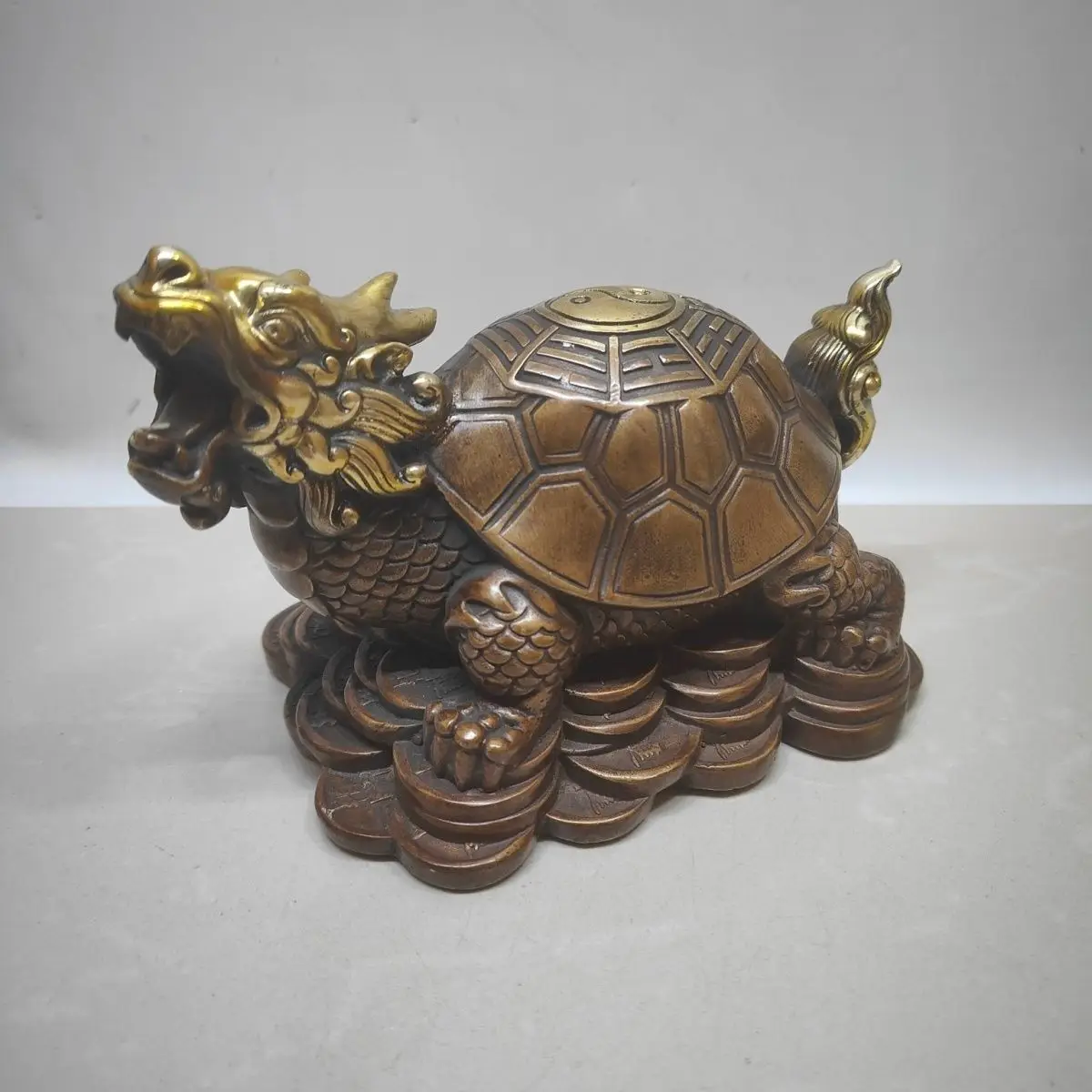 Gilt Brass Dragon Turtle with Bagua & Coin Patterns, Feng Shui Collectible Ornament
Gilt Brass Dragon Turtle with Bagua & Coin Patterns, Feng Shui Collectible Ornament