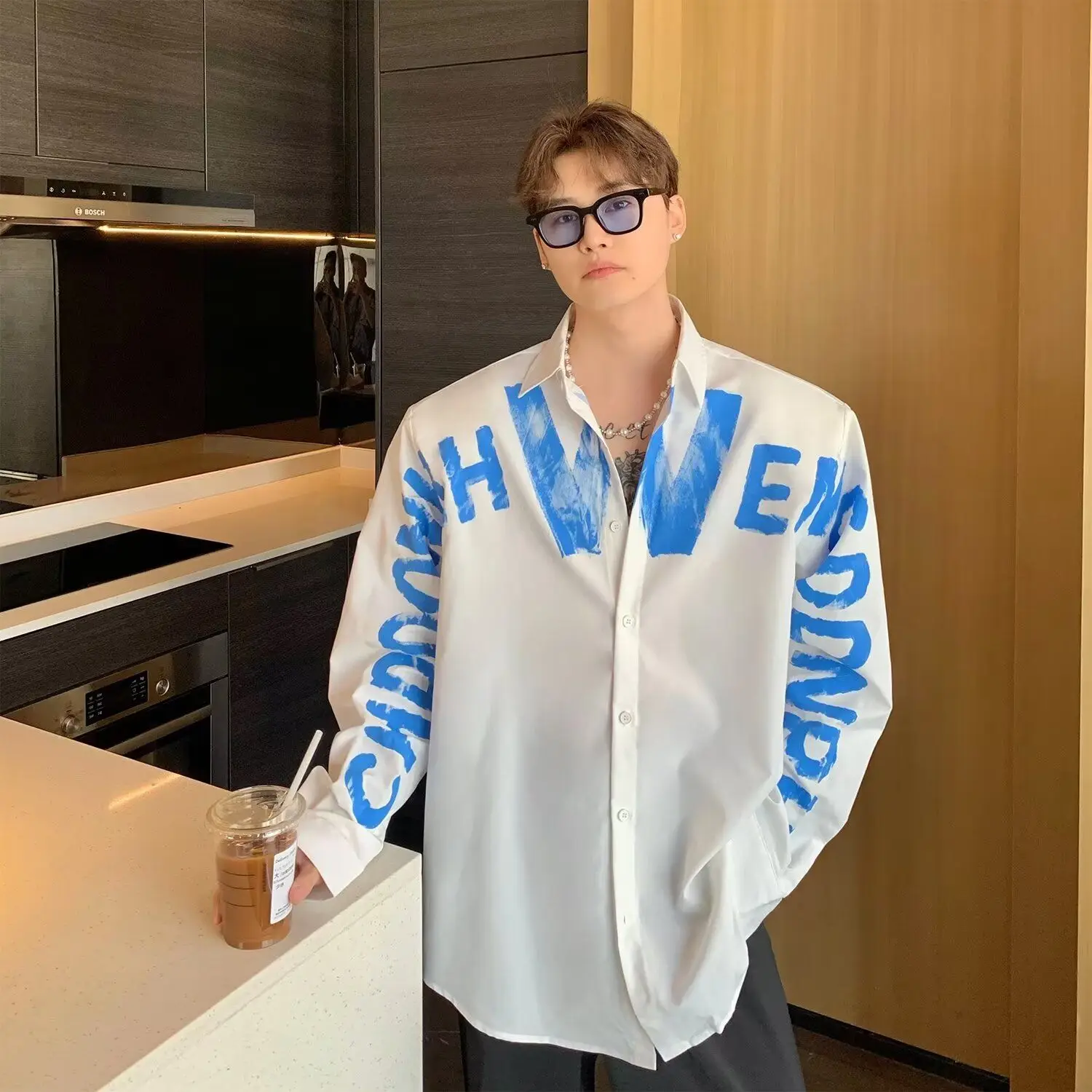 Sprayed graffiti letters and stylish design thin loose casual long-sleeved shirt trendy tops and versatile shirts
Sprayed graffiti letters and stylish design thin loose casual long-sleeved shirt trendy tops and versatile shirts