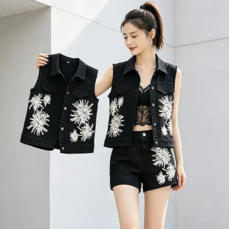 Two piece Women's Denim set Streetwear 2026 Spring/summer New Korean version Sequin nail bead Embroidery vest+Shorts Casual wear
Two piece Women's Denim set Streetwear 2026 Spring/summer New Korean version Sequin nail bead Embroidery vest+Shorts Casual wear
