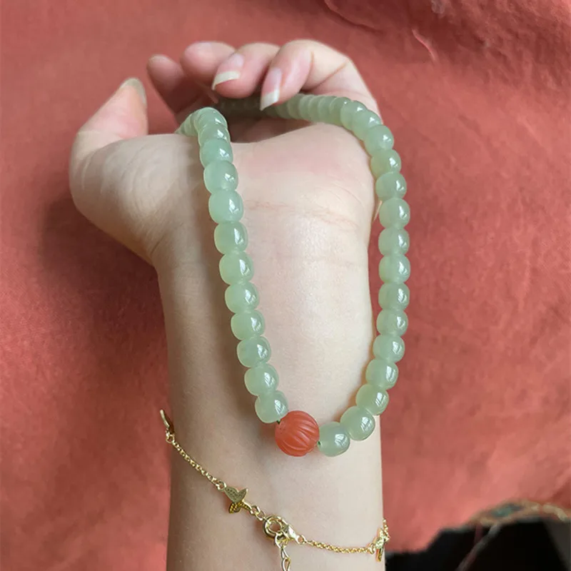 Qinghai Qingshui Hotan Jade 6x7mm Double Circle Women's Bracelet with Red Beads
Qinghai Qingshui Hotan Jade 6x7mm Double Circle Women's Bracelet with Red Beads