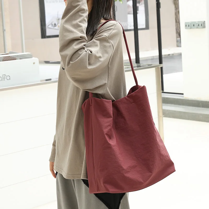 YIFAN 2025 High Quality Nylon Tote Bag Faion Travel oulder Handbag Women's Crossbody Bag Casual Simple Sle with Zipper
YIFAN 2025 High Quality Nylon Tote Bag Faion Travel oulder Handbag Women's Crossbody Bag Casual Simple Sle with Zipper