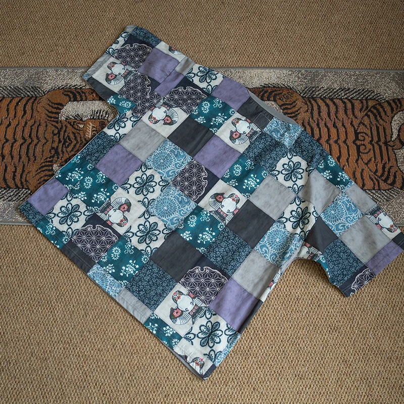 Loose silhouette lazy casual style front and rear splicing ethnic style short-sleeved T-shirt
Loose silhouette lazy casual style front and rear splicing ethnic style short-sleeved T-shirt