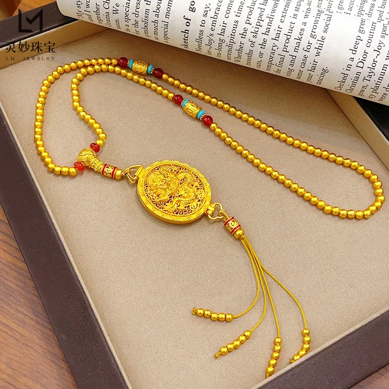 24K real gold ancient method engraved dragon pattern sachet Buddhist bead necklace au999 golden lotus sweater chain for women
24K real gold ancient method engraved dragon pattern sachet Buddhist bead necklace au999 golden lotus sweater chain for women