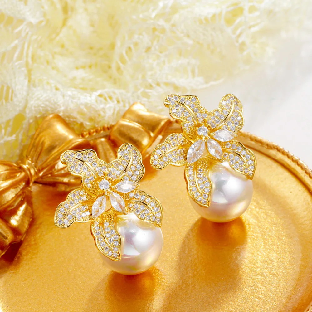 ThreeGraces Creative Flower Shape Cubic Zirconia Big Simulated Pearl Dangle Earrings for Women Fashion CZ Party Jewelry ER950
ThreeGraces Creative Flower Shape Cubic Zirconia Big Simulated Pearl Dangle Earrings for Women Fashion CZ Party Jewelry ER950