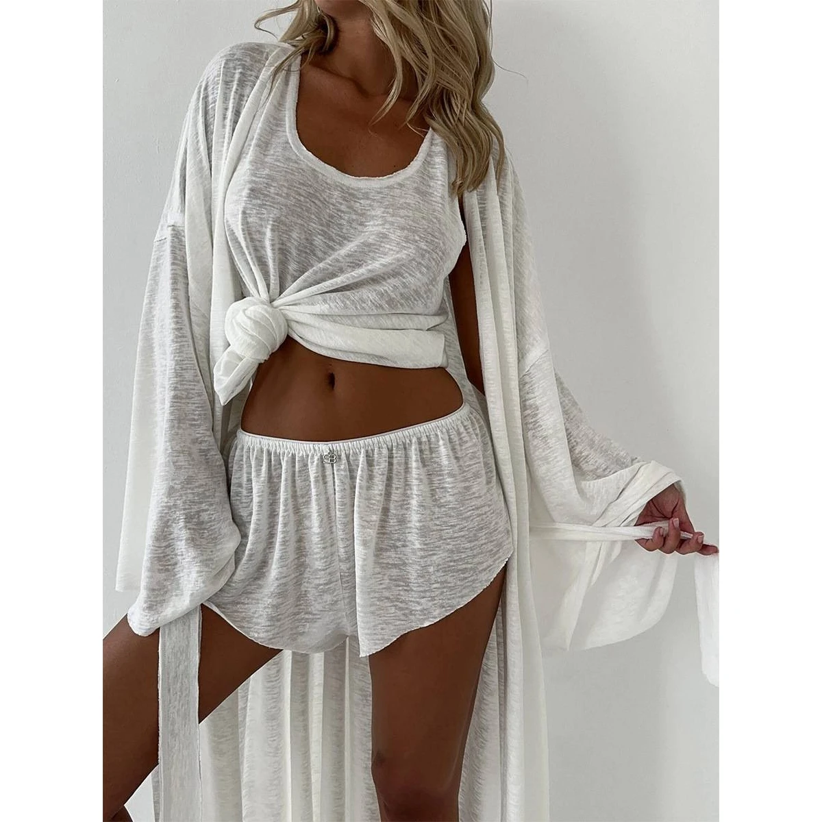 Transoceanic White Robe Vest Shorts Three-Piece Set Autumn 2026 New Semi-Transparent Beachwear Casual Ensemble for Men And Women
Transoceanic White Robe Vest Shorts Three-Piece Set Autumn 2026 New Semi-Transparent Beachwear Casual Ensemble for Men And Women