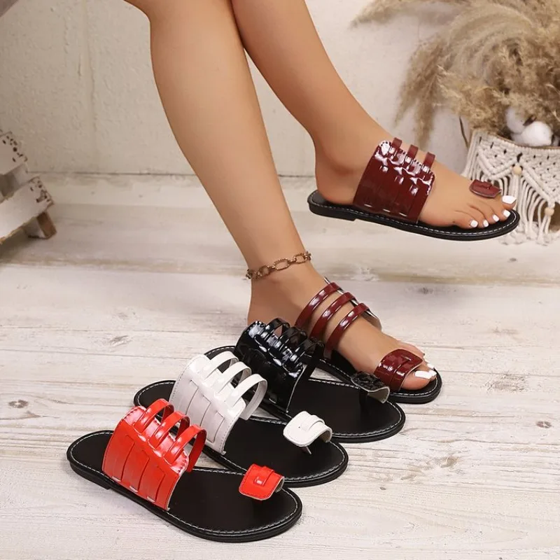 Дизайнерские летние новые женские тапочки, простые сандалии на плоской подошве с круглой головкой, модные и универсальные тапочки с открытым носком Mujer
Дизайнерские летние новые женские тапочки, простые сандалии на плоской подошве с круглой головкой, модные и универсальные тапочки с открытым носком Mujer